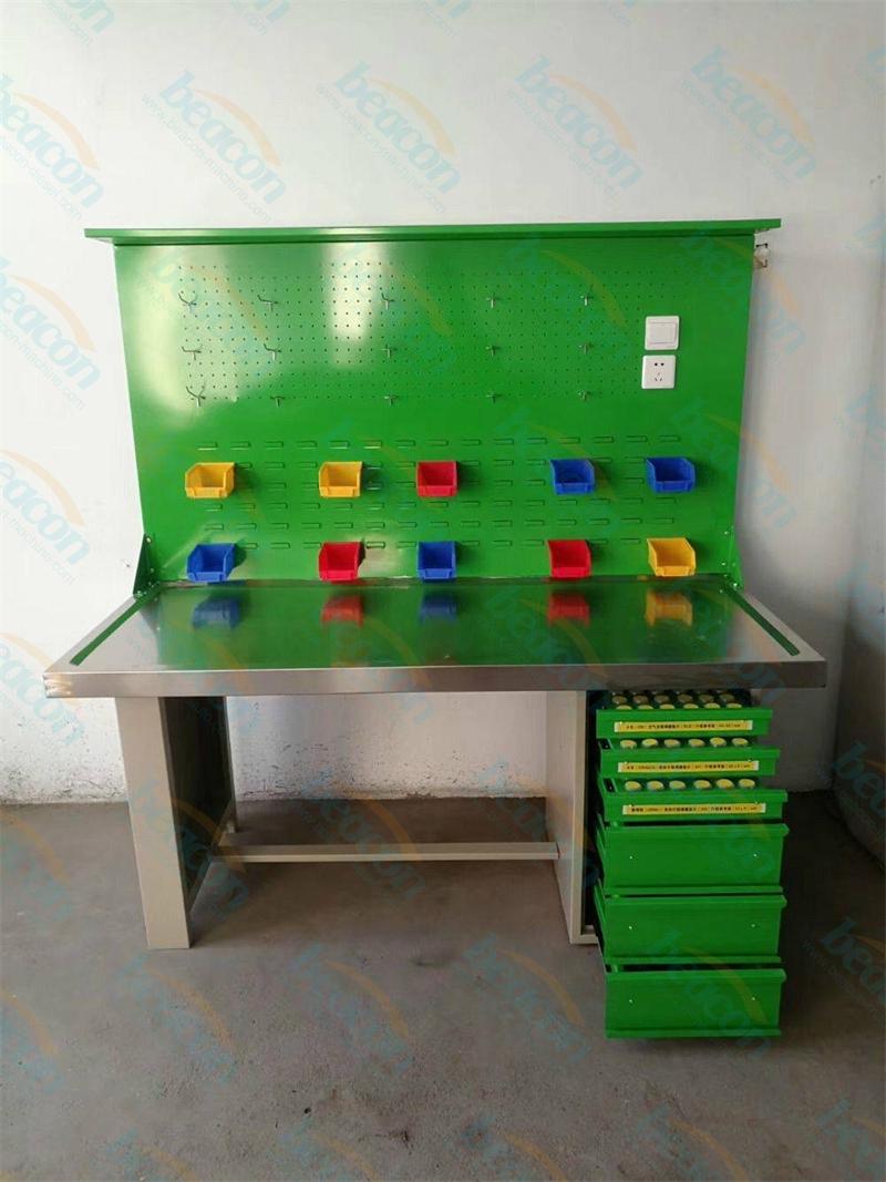 {Ergonomic Common Rail Injector Assembly and Repair Station}